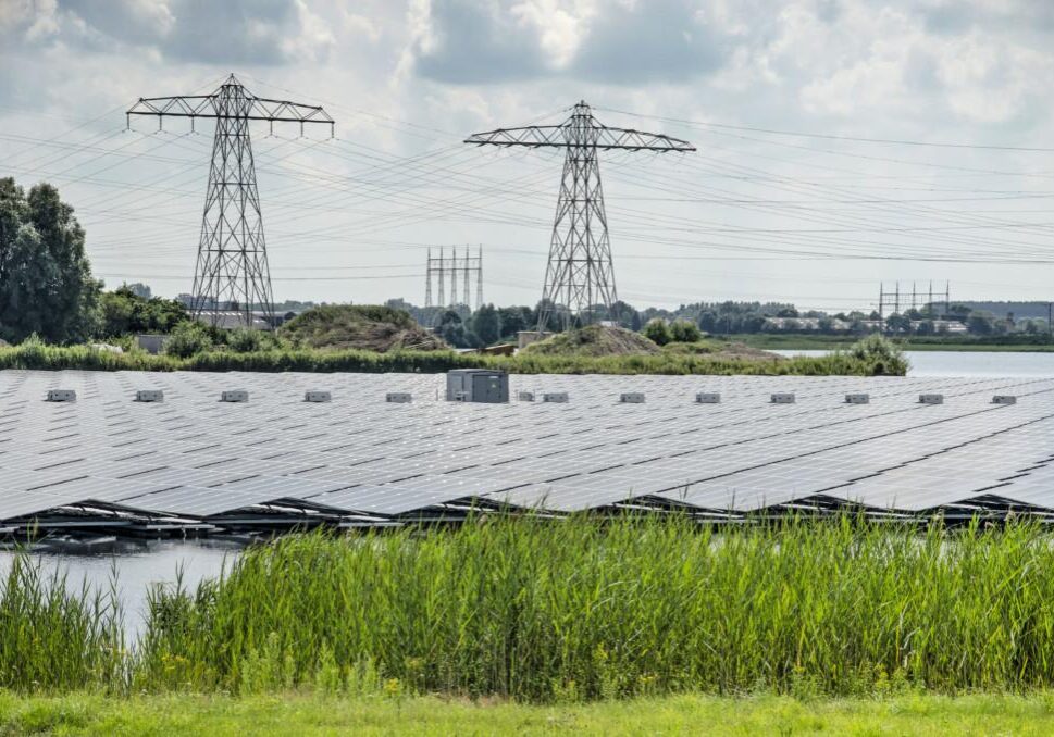 Zwolle, The Netherlands, August 4, 2021: large field of solar panels floating on artificial lake Sekdoorne Plas, created for gravel extraction